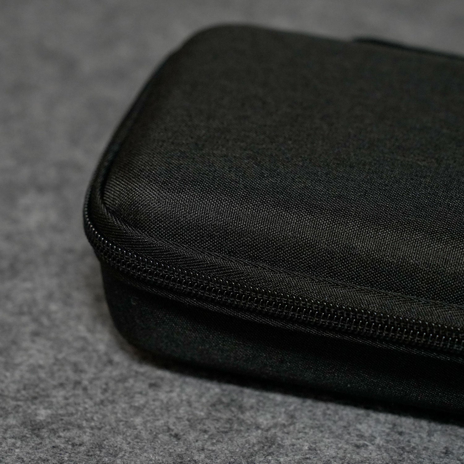 Black Akko Keyboard Carrying Case on a gray textured surface