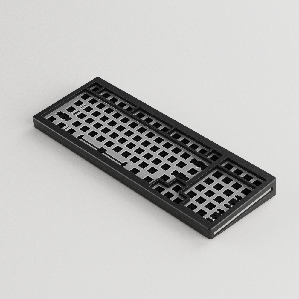 Black MonsGeek M2 QMK DIY Kit display sideways on a gray background